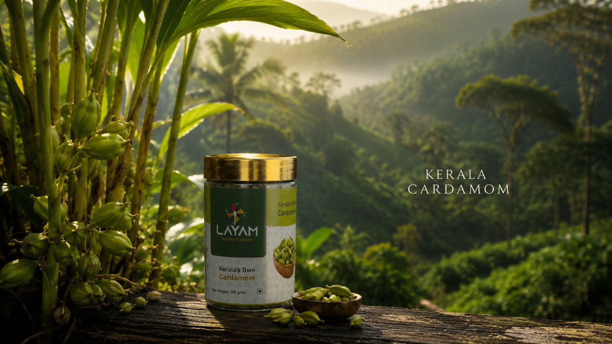 LAYAM cardamom jar on a wooden rail overlooking the misty Kerala cardamom hills at sunrise