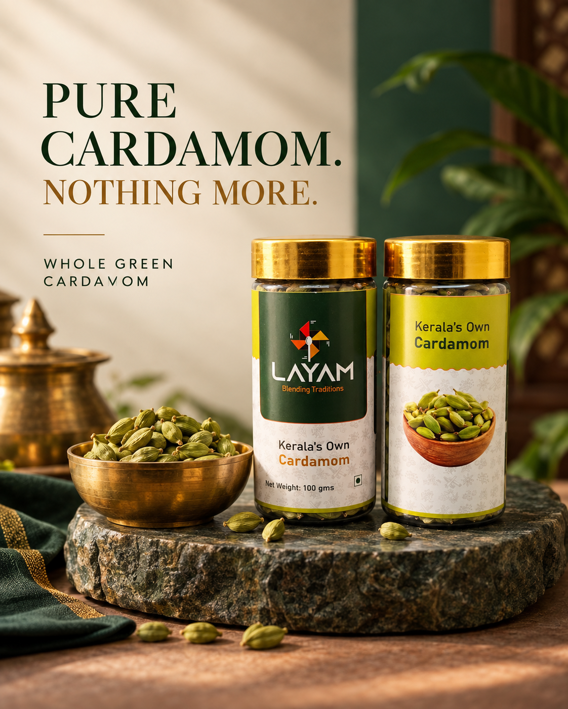 Pure whole green cardamom, nothing more — two LAYAM cardamom jars on stone with a brass bowl of pods