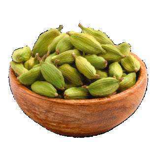 Whole green cardamom pods in a wooden bowl