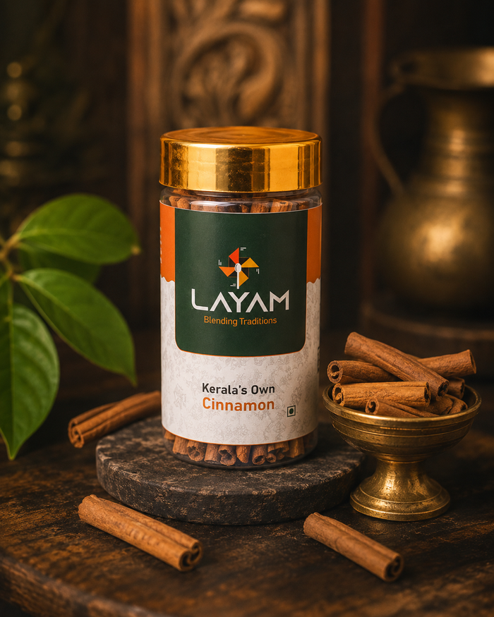 LAYAM Kerala's Own Cinnamon jar with hand-rolled cinnamon quills in a brass bowl