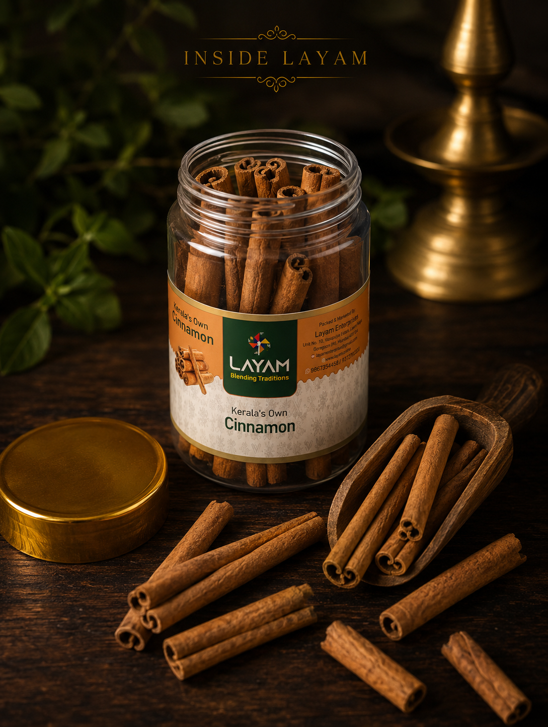 Open LAYAM cinnamon jar showing whole quills inside, with a wooden scoop