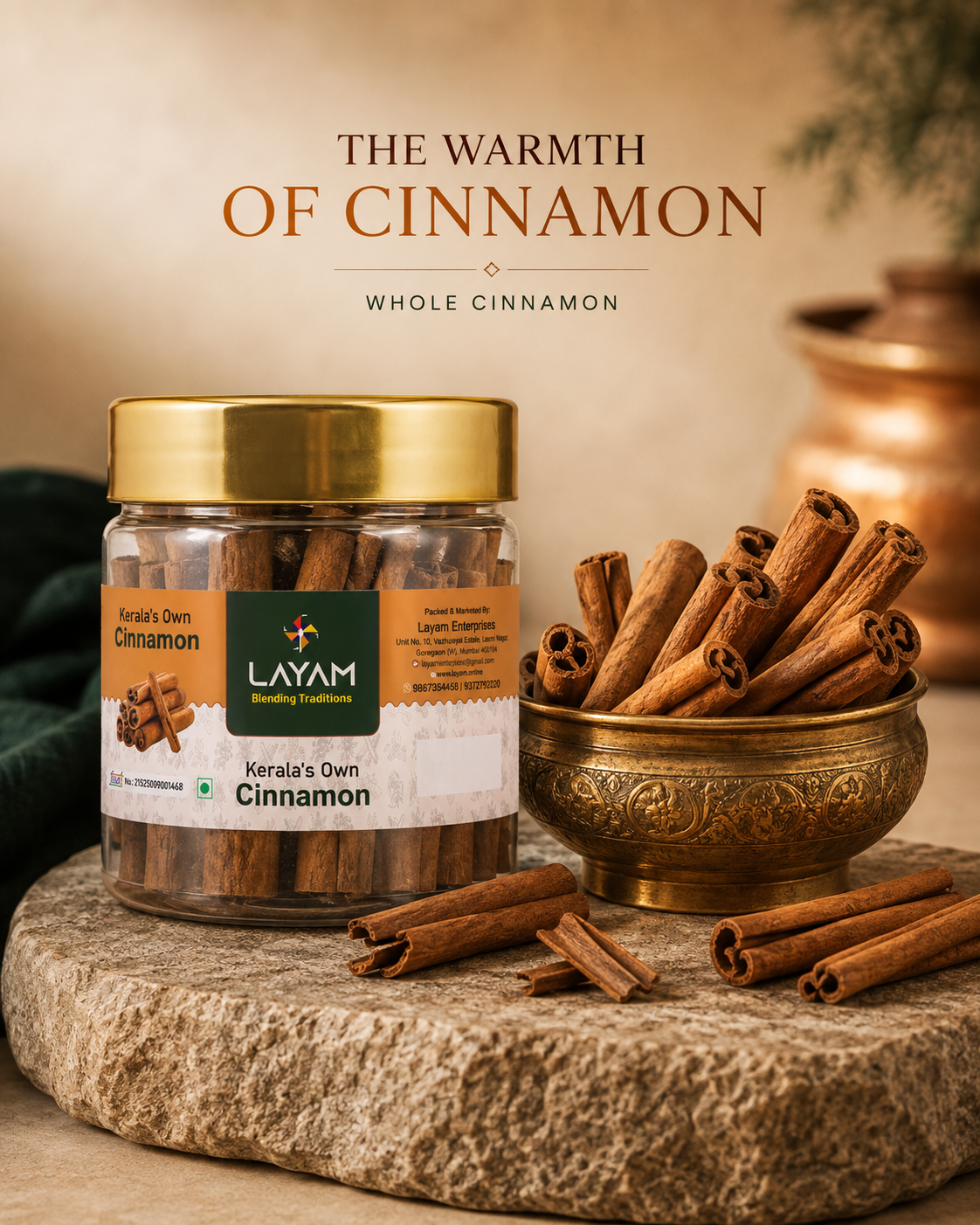 The warmth of whole cinnamon — the LAYAM jar on stone with a brass bowl of quills