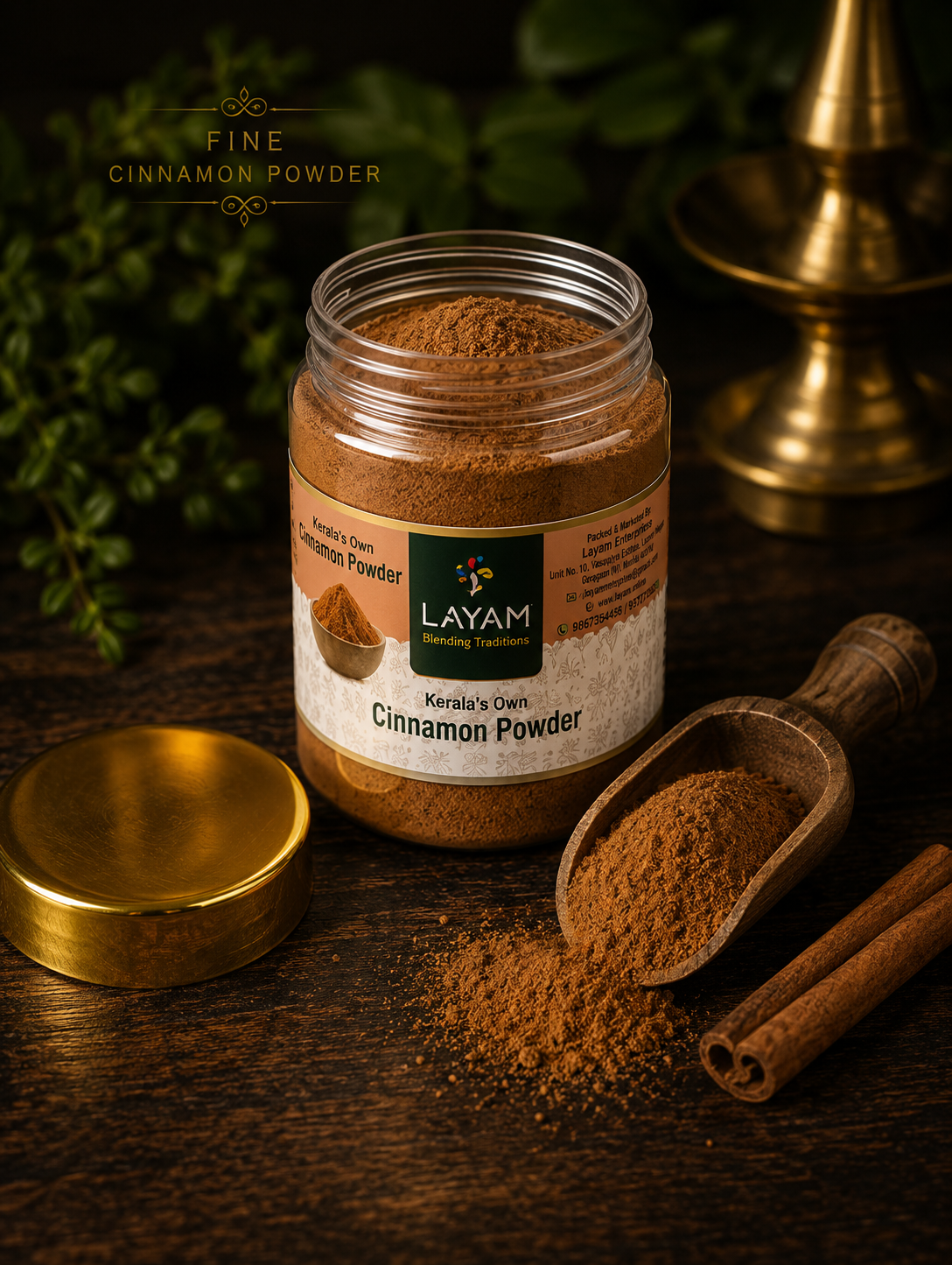 Open LAYAM cinnamon powder jar showing fine ground powder inside, with a wooden scoop