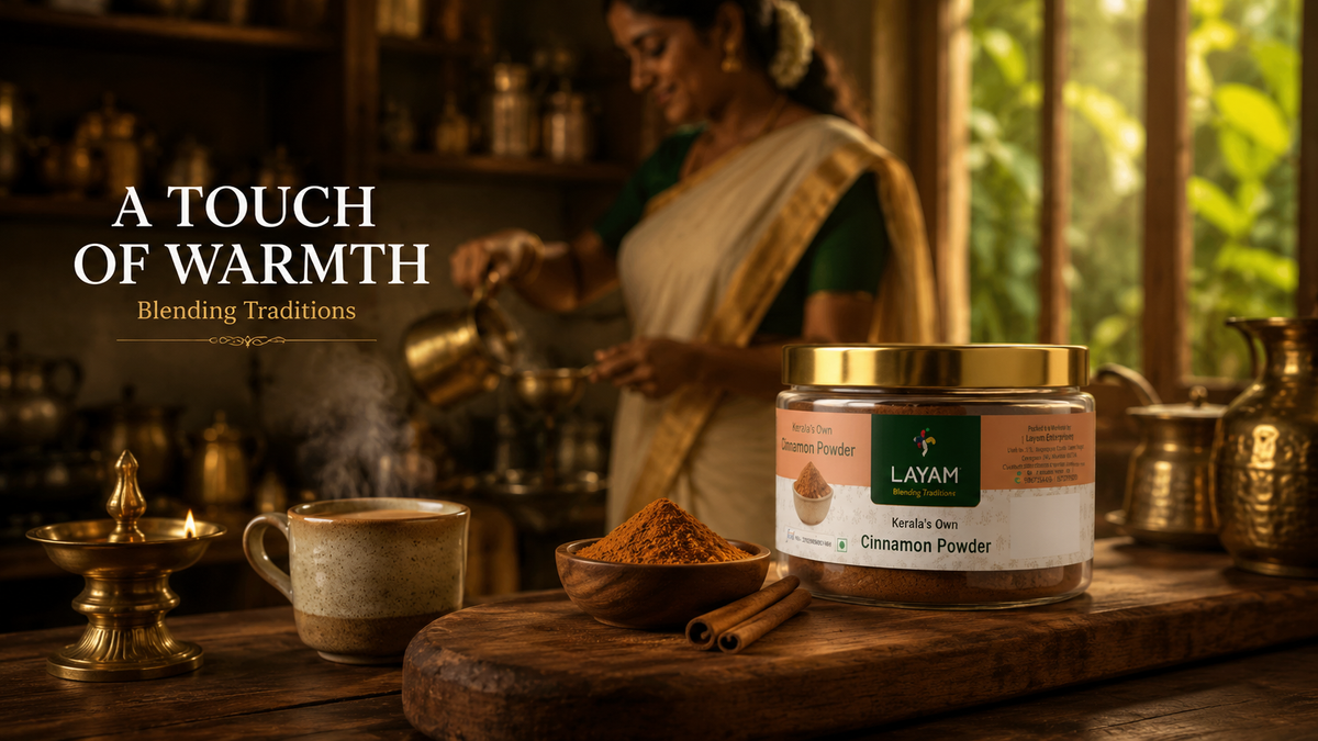 LAYAM cinnamon powder jar in a traditional Kerala kitchen with chai, brass vessels and a lit lamp